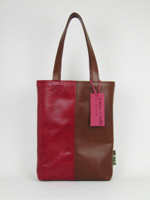 Product image of the shopper named Cozy Fireplace. This shopper is made from recycled leather in a colour combination of brown and red.