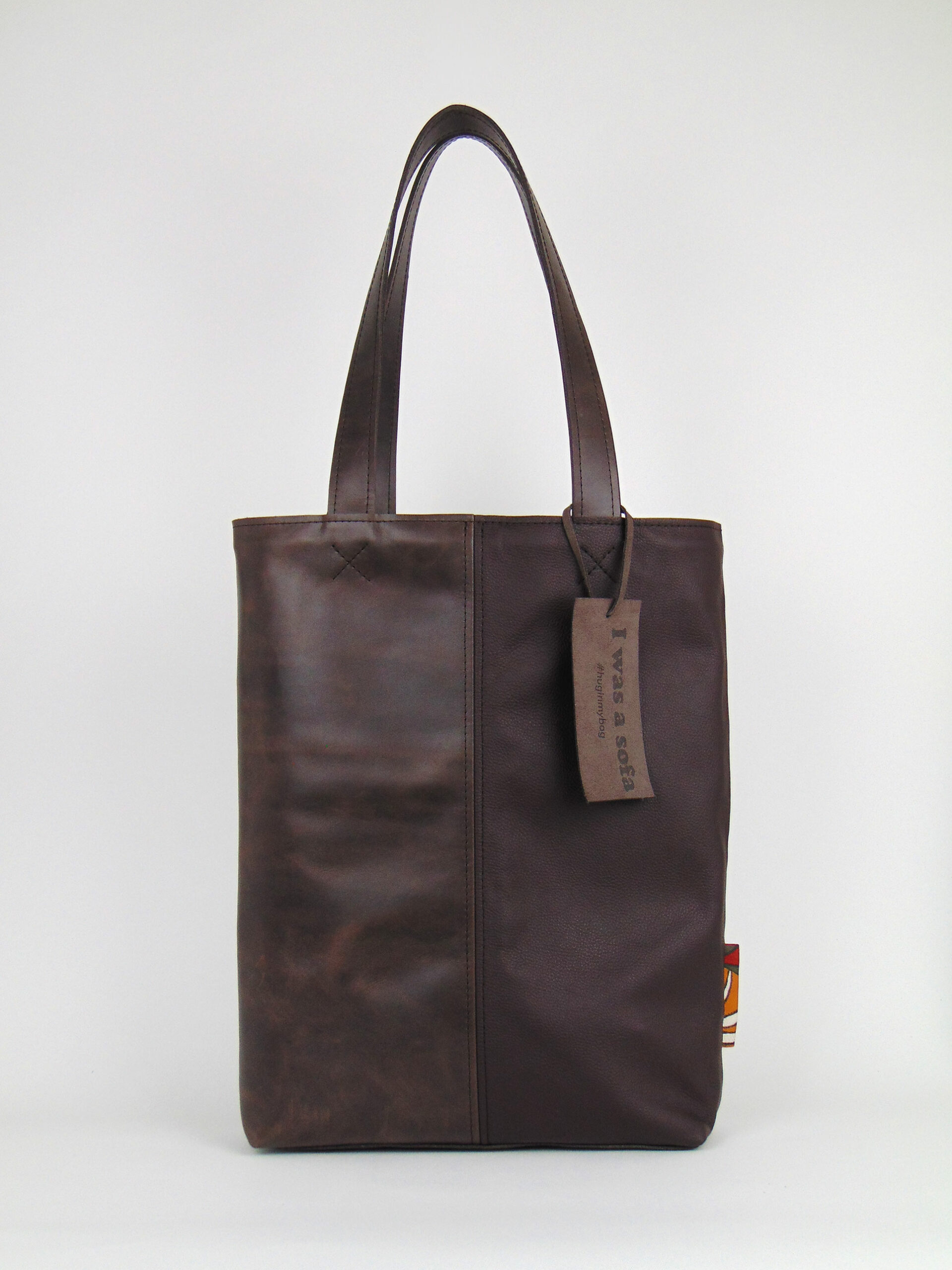 Product image of the shopper named Forest Walk. This shopper is made from recycled leather in a colour combination of two different brown tones.