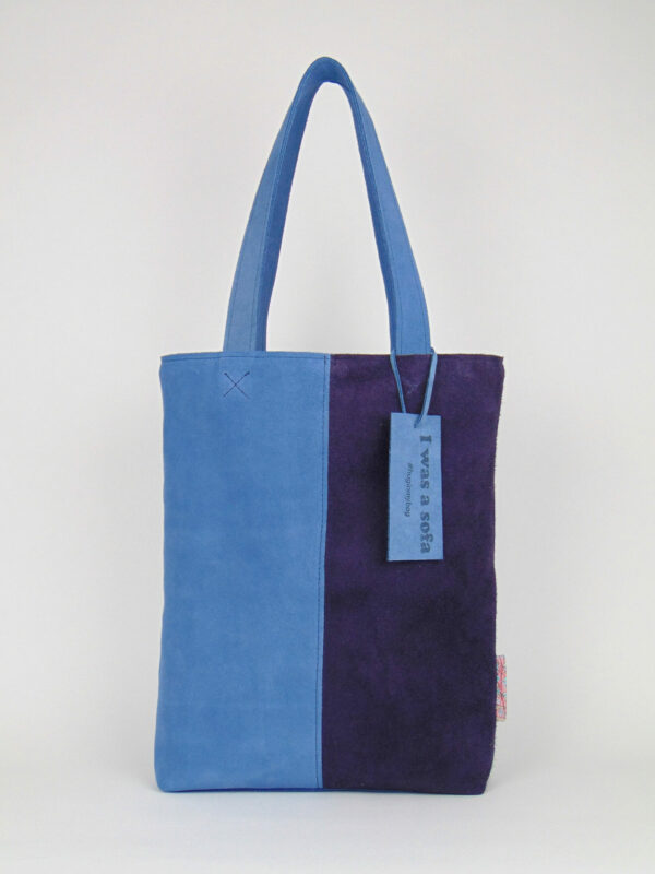 Product image of the shopper named Lavender Haze. This shopper is made from recycled suede in a colour combination of light blue and purple