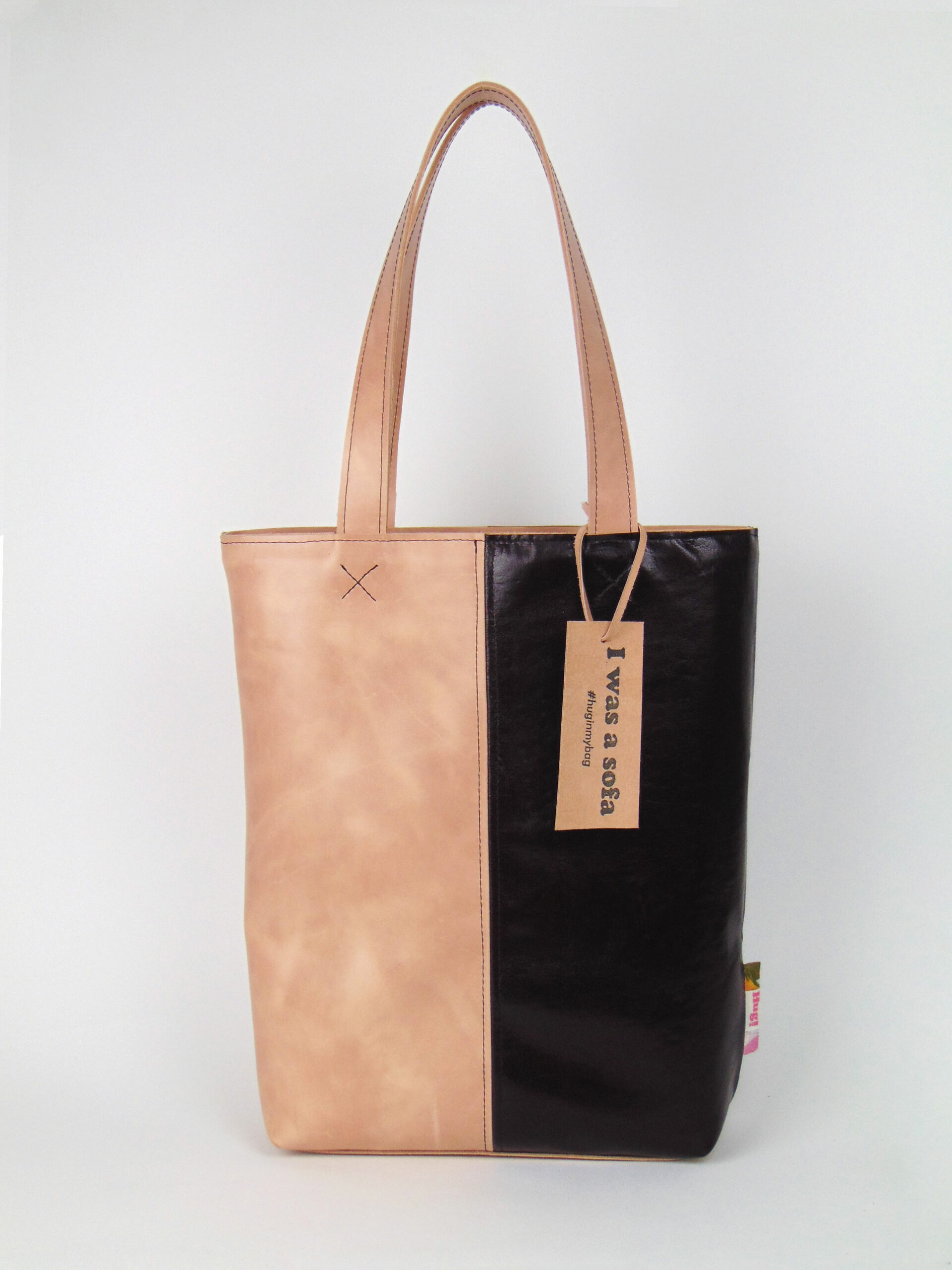 Product image of the shopper named Girl Boss. This shopper is made from recycled leather in a colour combination of nude and brown.