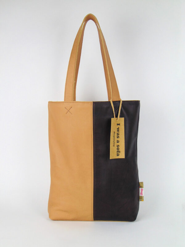 Product image of the shopper named Bubble Gum. This shopper is made from recycled leather in a colour combination of camel and brown