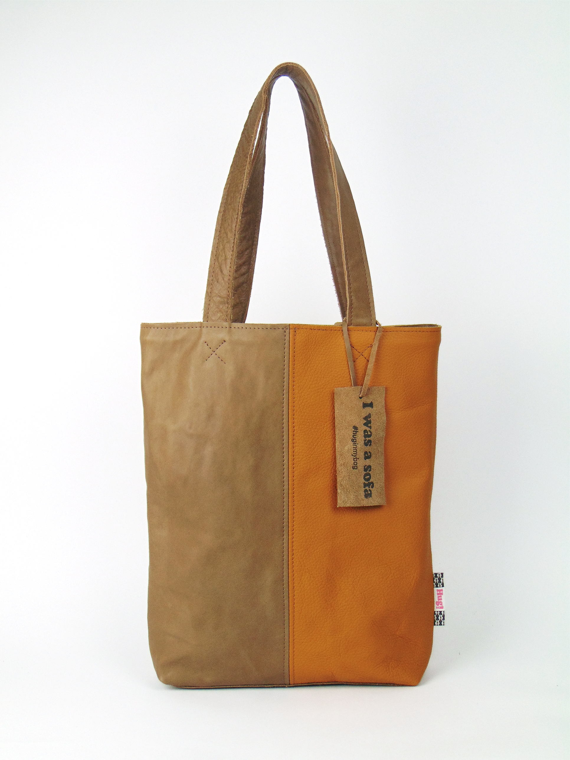 Product image of the shopper named Sunny Safari. This shopper is made from recycled leather in a colour combination of beige and yellow.