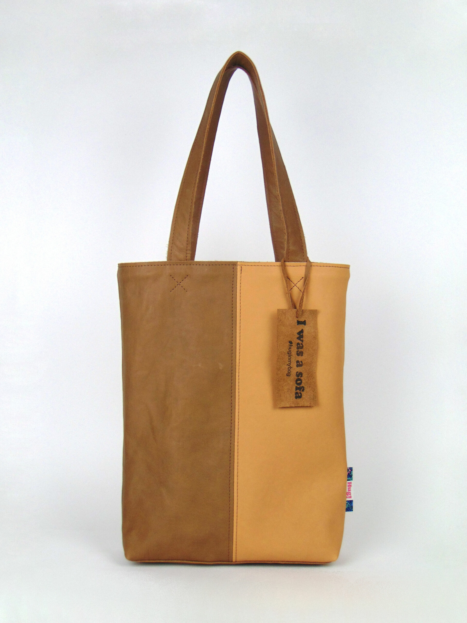 Product image of the shopper named Soft Vanilla. This shopper is made from recycled leather in a colour combination of beige and nude.