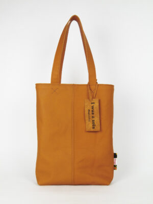 Product image of the shopper named Hello Sunshine. This shopper is made from recycled leather in a colour combination of different shades of yellow.